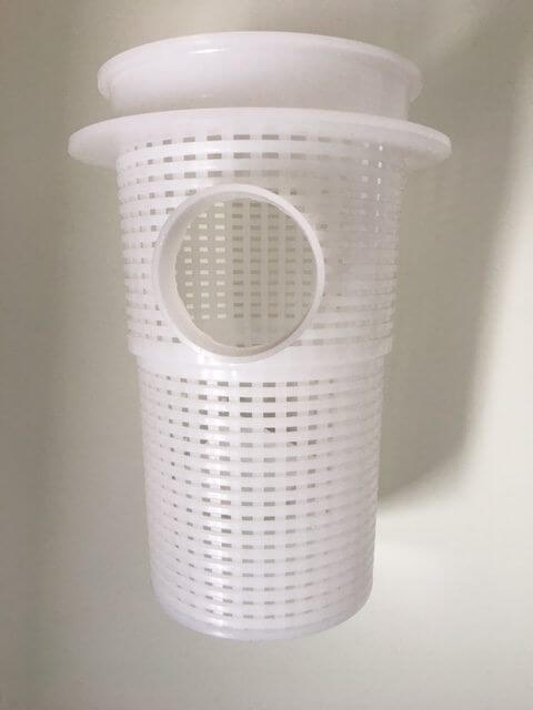Pump basket against a white background.