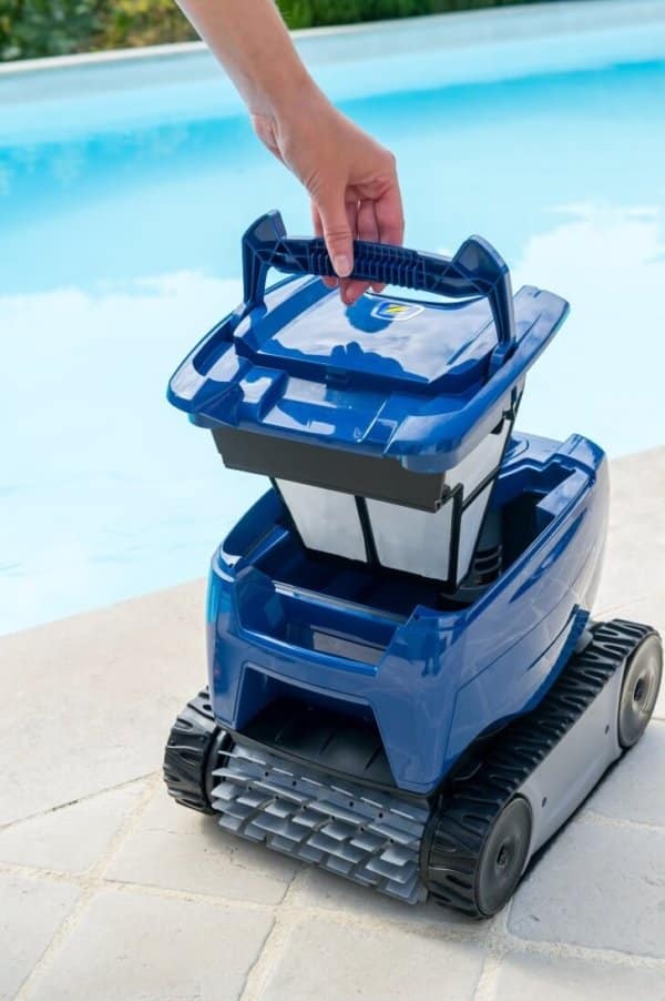 Zodiac Robotic pool cleaner next to a pool.